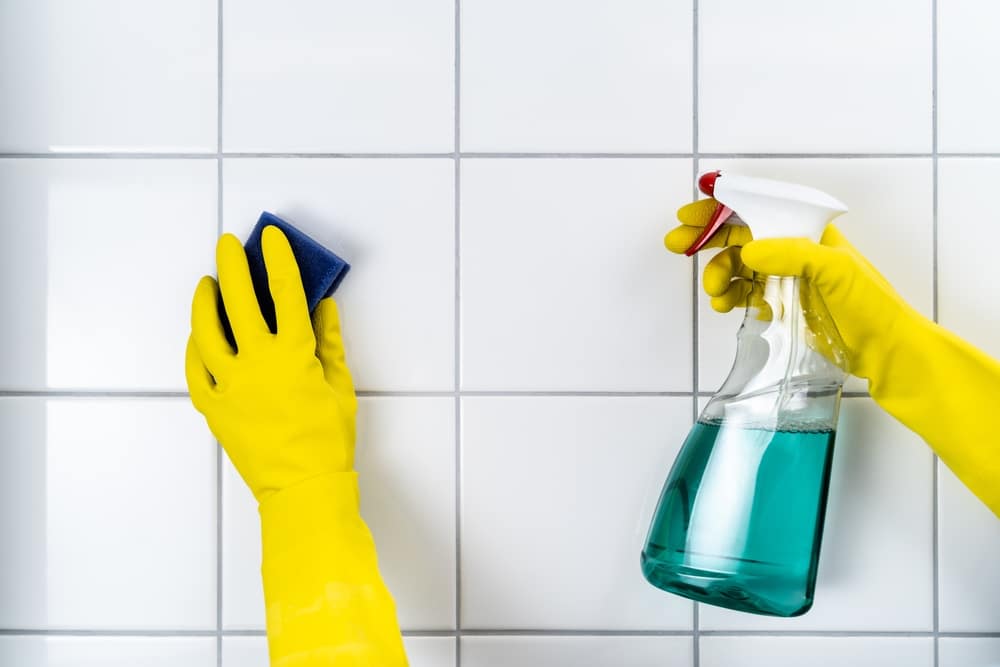 Tile Wall Grout Cleaning With Sponge And spray cleaner 