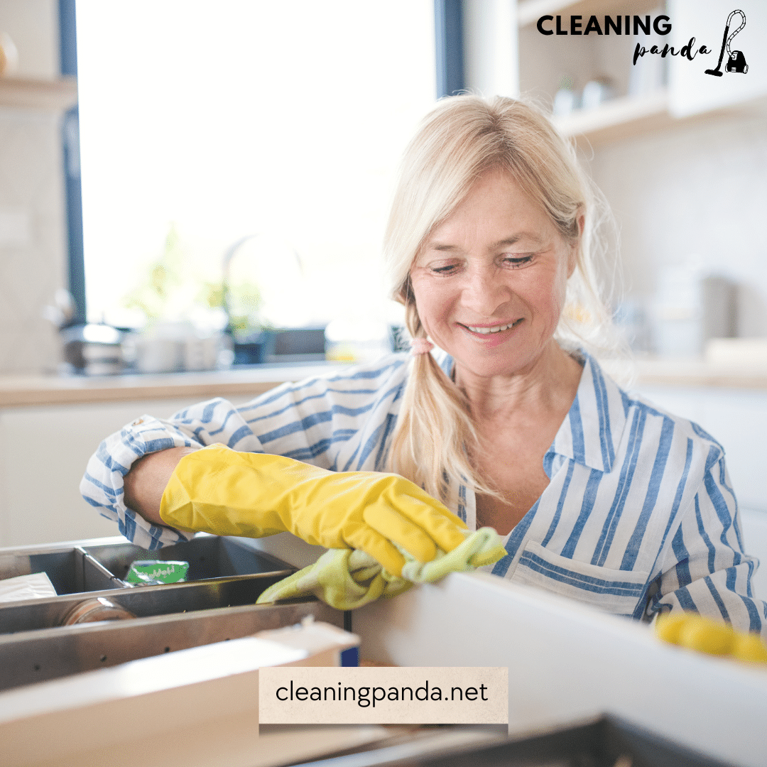 a senior women is cleaning the house